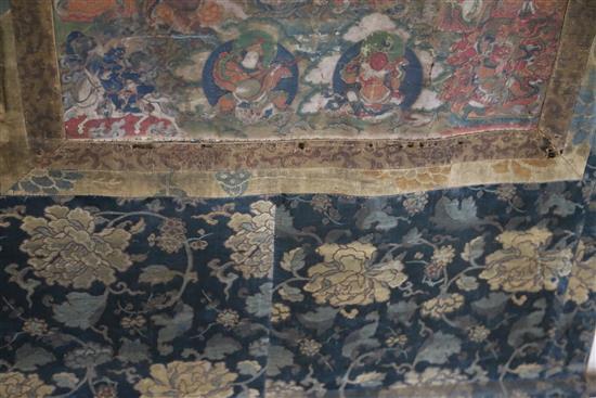 A thangka depicting Buddha Shakyamuni, Tibet, 18th/19th century, Total dimensions 123cm x 75cm, tears